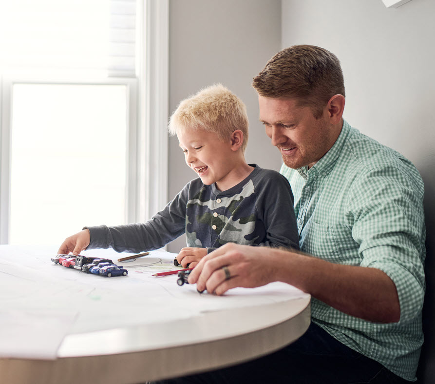 Father and son playing